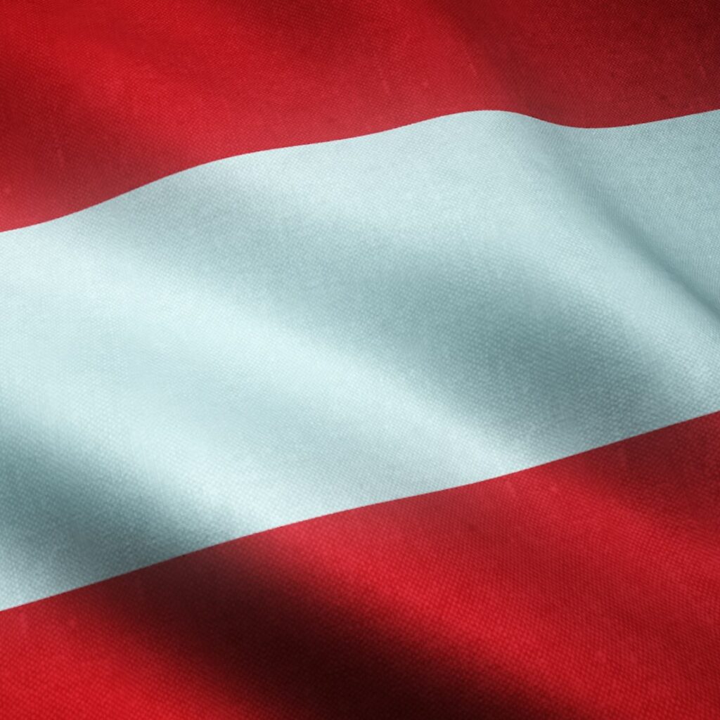 Closeup shot of the waving flag of Austria with interesting textures